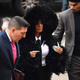 Illustration for article titled Cardi Bs Coat of Many Feathers Is the Only Acceptable Outfit for Court